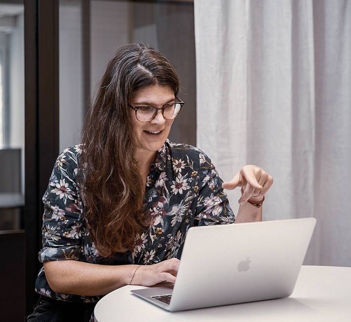 Woman looking at a laptop
