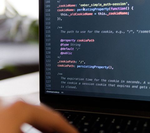 Laptop displaying some Ember Simple Auth source code